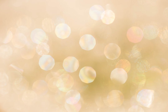 gold blurred background with bokeh lights