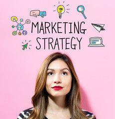 Marketing Strategy text with young woman on a pink background