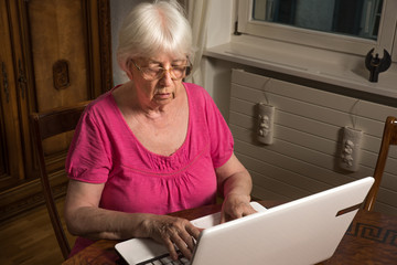 Older woman using her laptop 