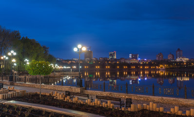 Fototapeta na wymiar Night city reflection on the river
