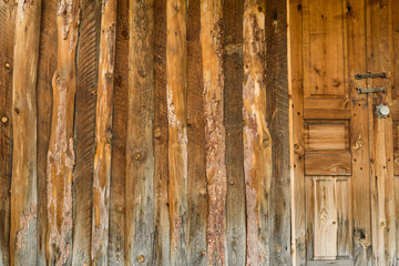 exterior log wall of a cabin in the Tusheti village of Bochorna