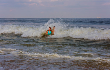 Fototapeta na wymiar Father and daughter at the ocean