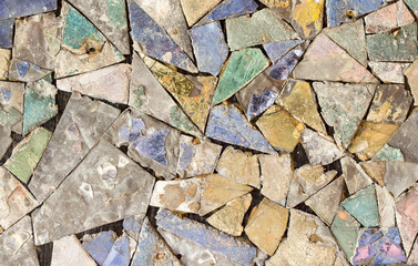 Colorful stone mosaic with chaotic pattern, seamless background photo texture