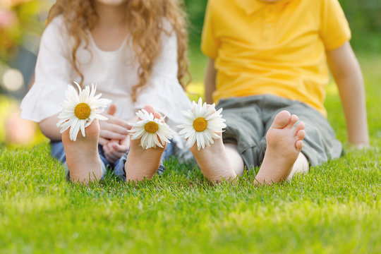 Little girl and boy with barefoot