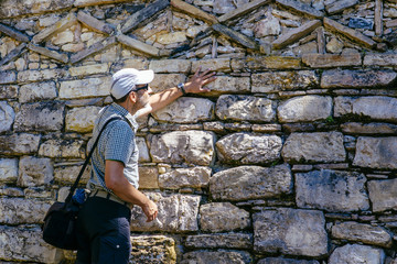 Fototapeta premium A tourist visit Kuelap, a precolumbian ruin complex in north peru / Chachapoyas/ Peru/ south america