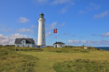 Fototapeta na wymiar Old light house at the west coast of Denmark. Hirtshals.