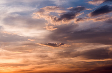 colorful dramatic sky with cloud at sunset.