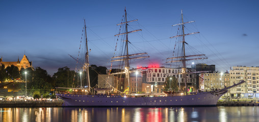 Fototapeta na wymiar Big sailing ships at night at haken terraces in Szczecin, Tall ship races 2017