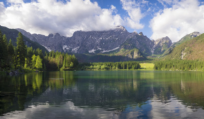 Fototapeta na wymiar Mountain lake in the Julian Alps in Italy
