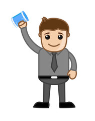 Young Businessman Showing a Coffee Mug