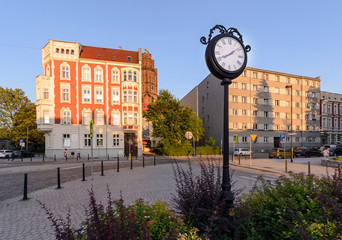 Fototapeta na wymiar Town clock in central part of Gliwice during sunset.