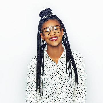 Cheerful attractive black woman in glasses looking at camera