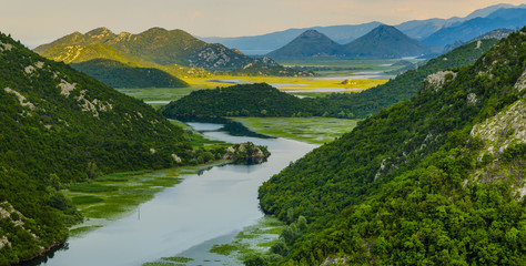 Naklejka na ściany i meble bend of the river flowing into Lake Skadar, Montenegro