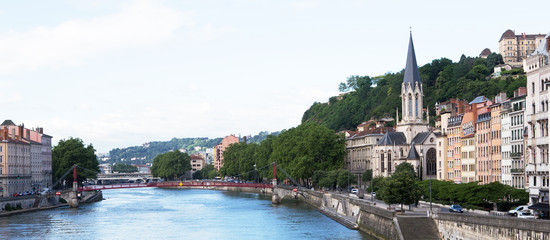 Fototapeta na wymiar River Rhone and Eglise St. Georges , Lyon