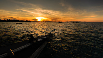 sunset with boat and sea, Malapascua, Philippines