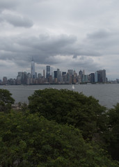 Fototapeta na wymiar New York City Skyline with Storm Clouds in the Sky