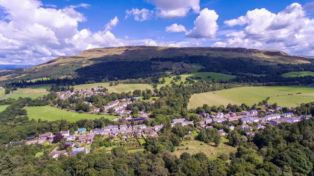 Aerial view of the village of Fintry with hills in the distance