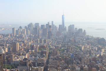 Panoramic view of Lower Manhattan as seen from the Empire State Building observation deck in the late afternoon (New York, USA)