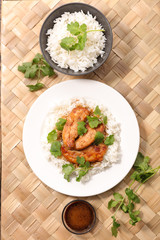 fried chicken with spicy sauce and rice
