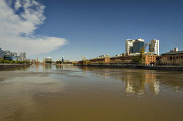 Fototapeta na wymiar A river between buildings