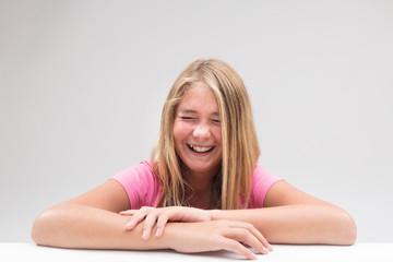 Obraz na płótnie Canvas laughter explosion little girl portrait