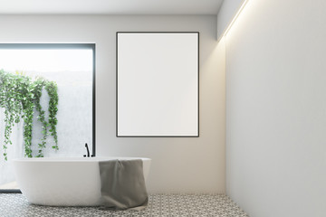 Fototapeta na wymiar White bathroom, round tub, poster, plant