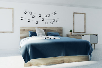 White bedroom, photo gallery, two posters, side