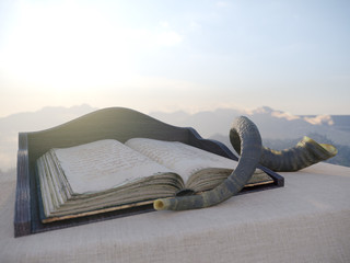 jewish holiday background with old book and landscape concept photo