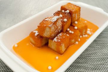 Crispy french toast with Thai tea cream sauce