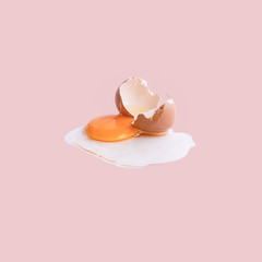 Cracked egg on pastel backgrounds