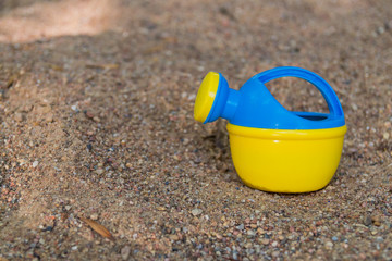 Water can in the sand 2
