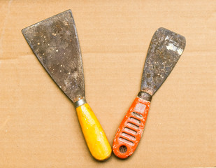 The carpenter tools,old gyan putty look old and dirty.