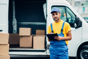 Cargo delivery service, male courier unload truck