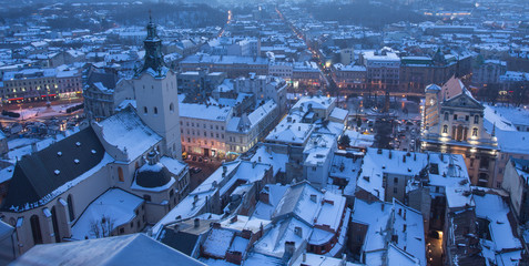 Naklejka premium Winter view on the downtown in Lviv, Ukraine.