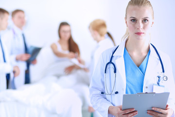 Surgeon and doctor analyzing x-ray together in medical office . Surgeon and doctor.