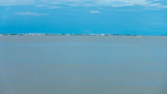 Cargo ship, vessel, boat and barge moving and floating on river ocean. Logistics and transportation. 4K time lapse footage vdo