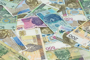 Background made of different polish zloty banknotes