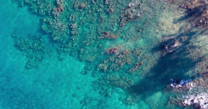 Aerial View Of Crystal Clear Tropical Blue Water Ocean Water From Above