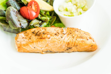 salmon steak with salad
