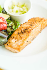 salmon steak with salad