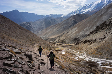 A man and a woman trekking on Markha valley trekking route - Leh Ladakh - India © jumpscape