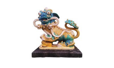 Statue of creature like dragon combine lion gold and jade color use to decorate garden and china gate with clipping path