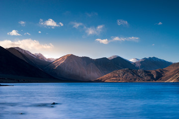 Light casting on moutain range alongside Pangong lake, Ladakh, India