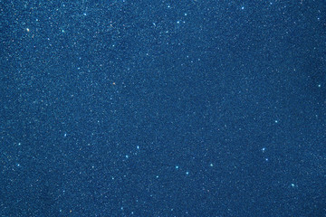 glitter vintage lights background. blue and black. de focused