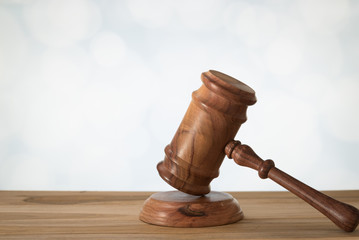 A wooden judge gavel and soundboard. Concept of Law, Legal, Auction, Lawsuit.