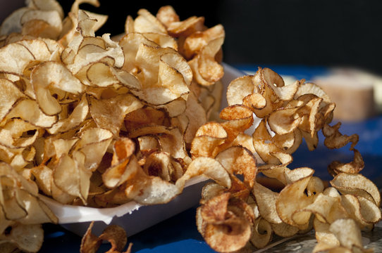 Closeup of Freshly made curly potato chips