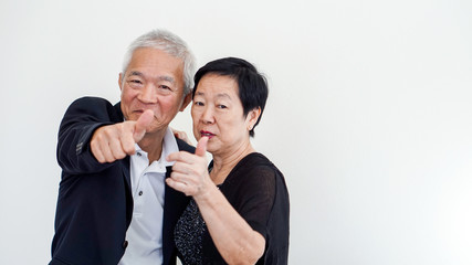 Happy Asian senior couple. Success in business and life, togher forever