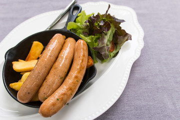 delicious sausages with french fries