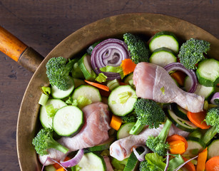  raw vegetables with chicken drumsticks
