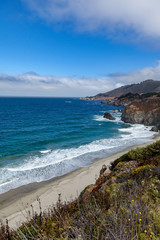 Empty beach and cliff view of Big Sur California